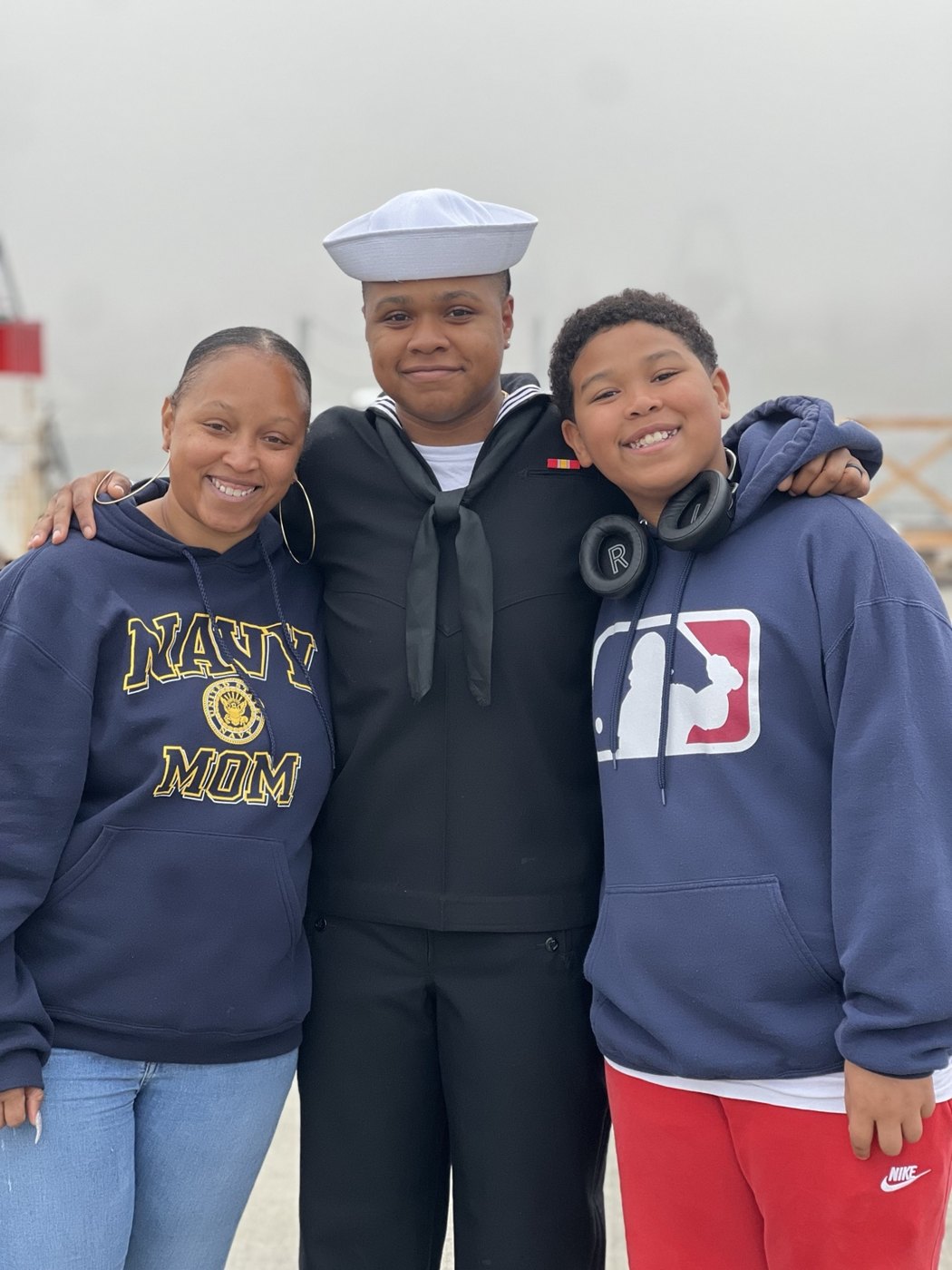 Marquita with her children, including her daughter in Navy uniform